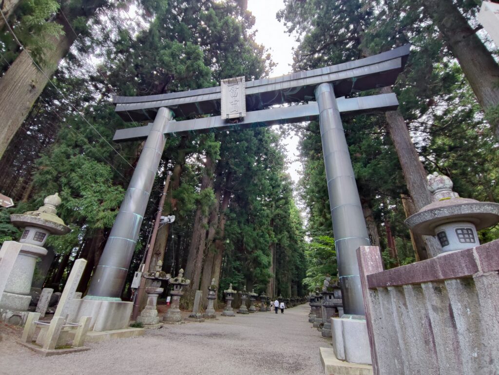 Fujiyoshida Sengen Shrine with traditional torii gates and lush greenery, a serene spot at the foot of Mt. Fuj