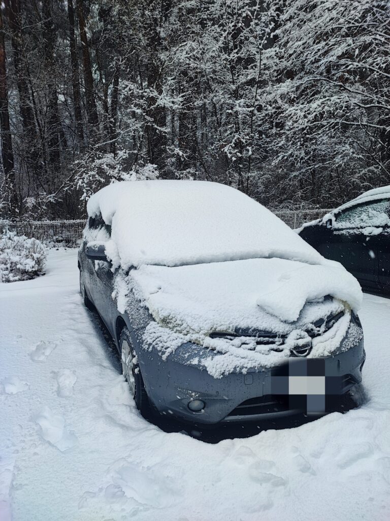 car covered in snow in march kawaguchiko fujiyoshida