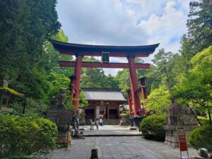 Fujiyoshida Sengen Shrine with traditional torii gates and lush greenery, a serene spot at the foot of Mt. Fuji