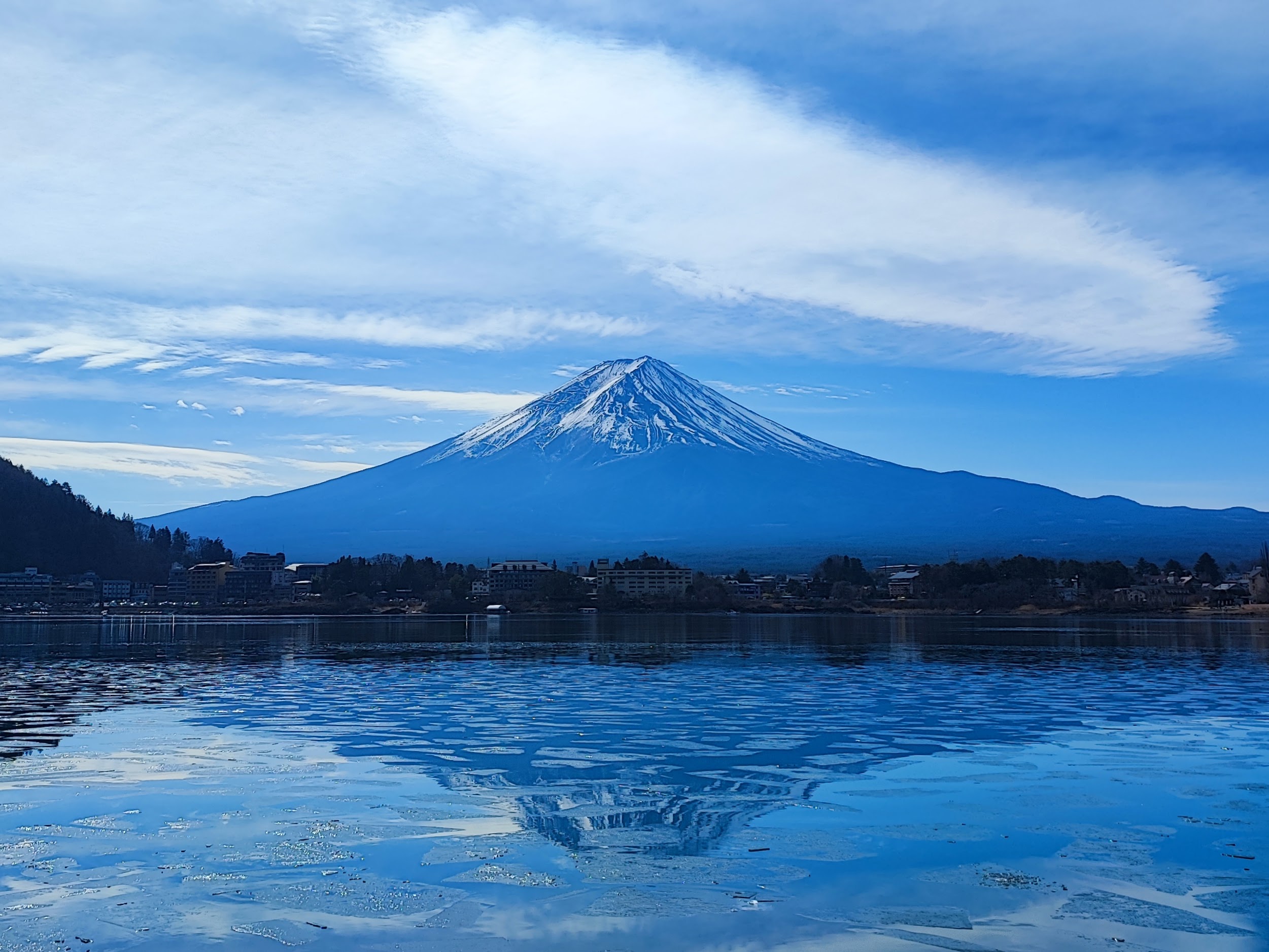 mt.fuji mirror reflection with iced lake kawaguchi